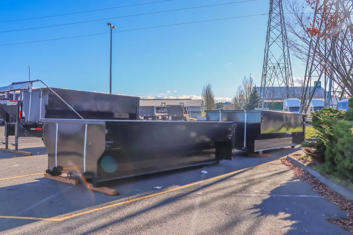 Roll-off dumpster ready for waste disposal at job site for Demolition Dumpster Rental in Glenville